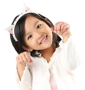 Little girl featured in the LaQ sweet collection headband set